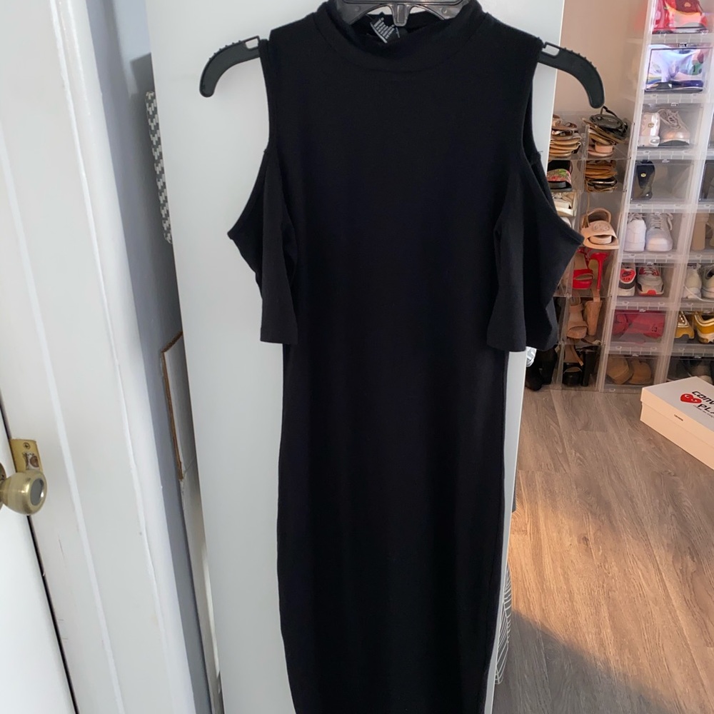 Black mock neck bodysuit with shoulder cut out